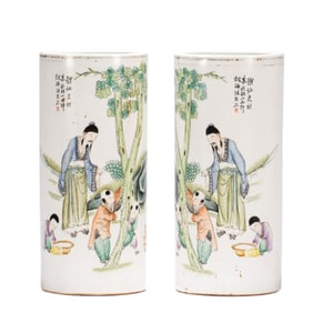 A pair of porcelain hat tubes of Qing Dynasty poetic characters