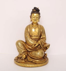 A Qing Dynasty bronze gilt Guanyin ornament