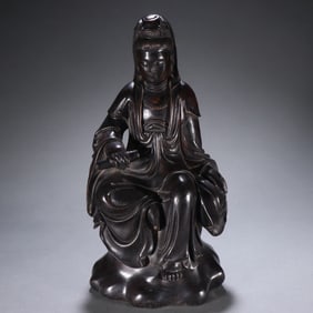 A Qing Dynasty rosewood scroll Guanyin