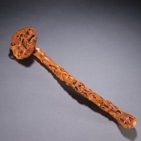 A Qing Dynasty boxwood dragon wishful ornament