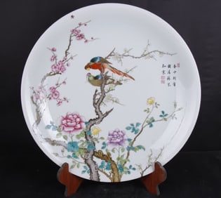 A Qing Qianlong enamel flower and bird plate