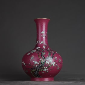 A Qing Yongzheng carmine red magnolia flower vase