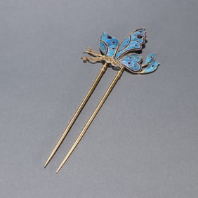 A Qing Dynasty silver-gilt emerald butterfly hairpin