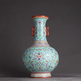 A Qing Qianlong pastel turquoise green ground red dragon flowered amphora