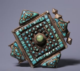 A Qing Dynasty silver-inlaid turquoise gawu box