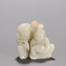 A statue of Hetian jade seed material and two immortals in the Qing Dynasty