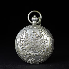 A European silver engraved sun, moon and stars pocket watch