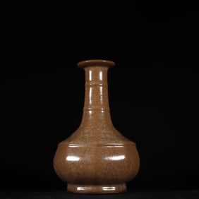 A Song Dynasty Longquan kiln yellow glaze ice crack string pattern octagonal bottle