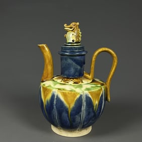 A piece of Tanggong County kiln three-color lion wine