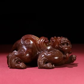 A Han Dynasty white jade beast ornament