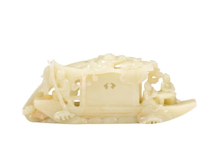 A Qing Dynasty Hetian jade boat-shaped ornament