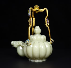 A Qing Dynasty Hetian jade sheep's head pot