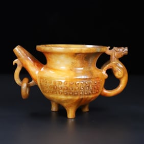 A three-legged pot with a single dragon ear of ancient jade