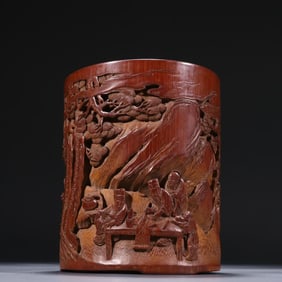 A Qing Dynasty bamboo carved character story picture pen holder
