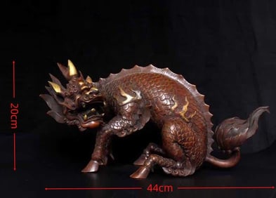 A Qing Dynasty bronze unicorn ornament