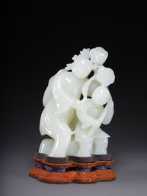 A Qing Dynasty Hetian jade lotus boy ornament