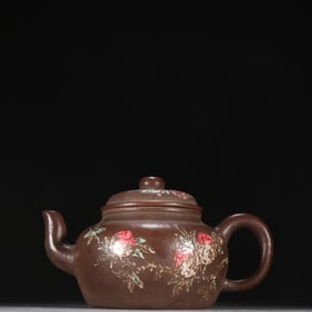 A Qing Dynasty Detang model purple sand pastel longevity peach pattern teapot