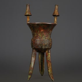 A Western Zhou bronze beast face full of work