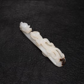 A piece of Hetian jade seed material Canglong godson with hook
