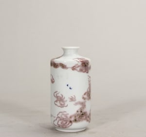 A Qing Dynasty Kangxi blue and white glazed red dragon pattern snuff bottle