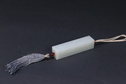 A Hetian jade "plum orchid bamboo chrysanthemum" pendant