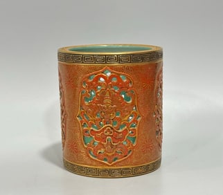 A Qing Qianlong enamel alum red gold-painted flower entwined branch carved hollow cloud bat pattern