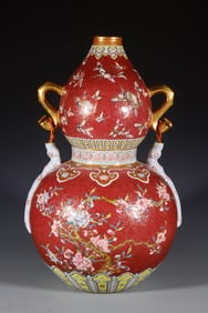 A Qing Qianlong enamel color ruyi ear carmine red flower gourd bottle