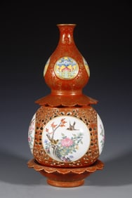 A Qing Qianlong hollow four seasons flower and bird turning gourd