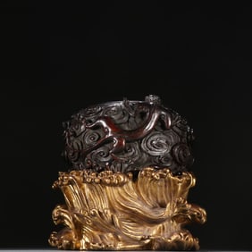 A Qing Dynasty rosewood dragon pattern pen wash