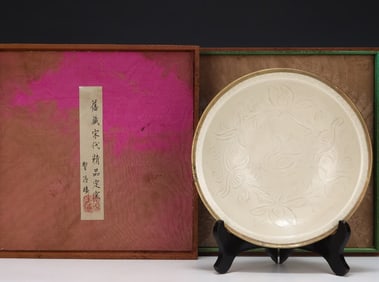 A Song Dynasty Ding kiln secretly carved goose pattern panq