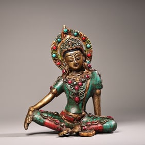A Buddha statue of Tara in Tibetan Tantric Freedom with gemstones painted with gold painting