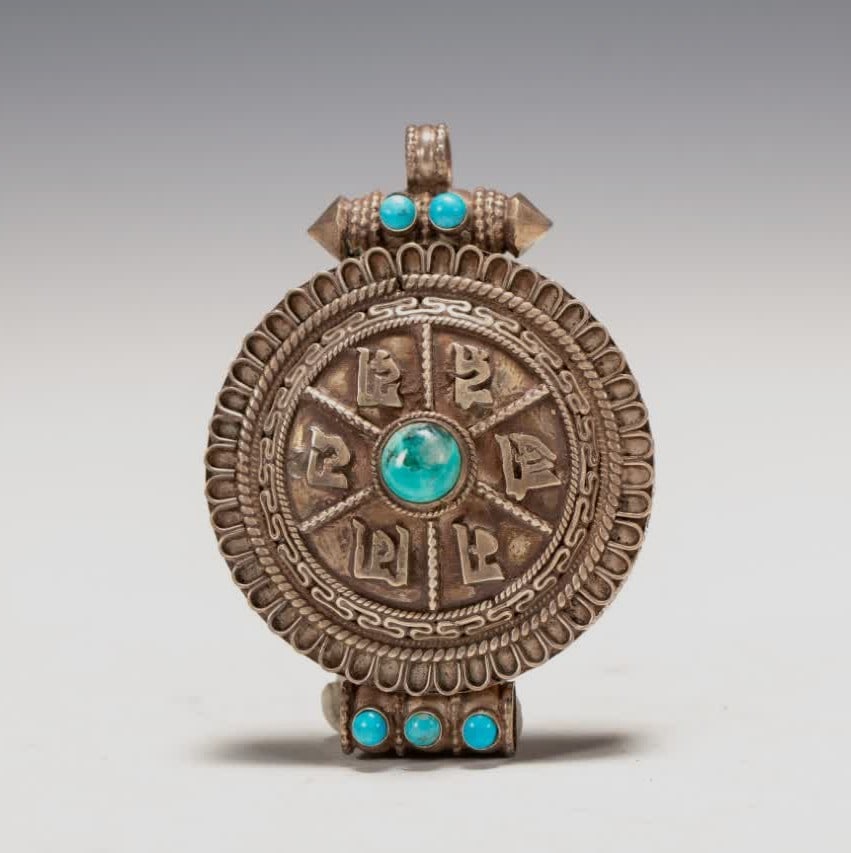 A Qing Dynasty Tibetan silver gawu box (1 of 6)