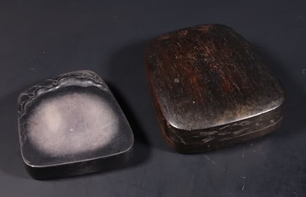 A Qing Dynasty lotus leaf pattern purple end inkstone