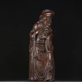 A Qing Dynasty agarwood figure statue