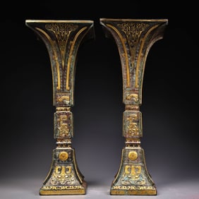 A pair of bronze gold square hub vases