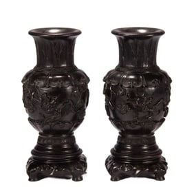 A pair of Qing Dynasty rosewood vases