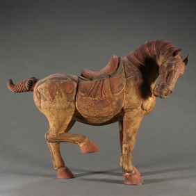 A Tang Dynasty copper tire painted horse ornament