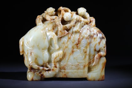 A Qing Dynasty Hetian jade boy washing elephant ornament