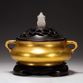 A Qing Dynasty copper gilt incense burner