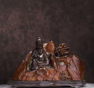 A Qing Dynasty old agarwood "immortal sitting on the rock" ornament