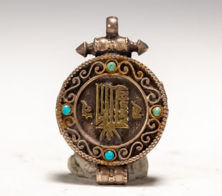 A Qing Dynasty Tibetan silver gawu box