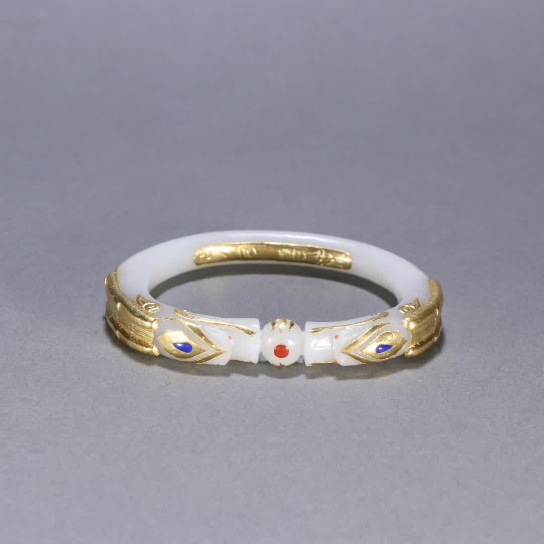 A Qing Dynasty Hetian jade-wrapped pure gold two-dragon bite bead bracelet (1 of 9)