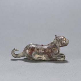 A Han Dynasty bronze gold and silver tiger ornament