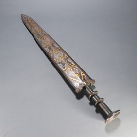 A Han Dynasty copper gold and silver sword