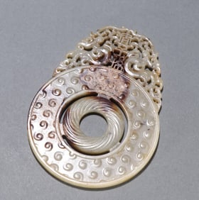 A Han Dynasty ancient jade tadpole pattern out of the outline