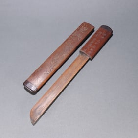 A bamboo carved flower poetry paper knife