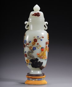 A Qing Dynasty Hetian jade treasure inlaid cap bottle