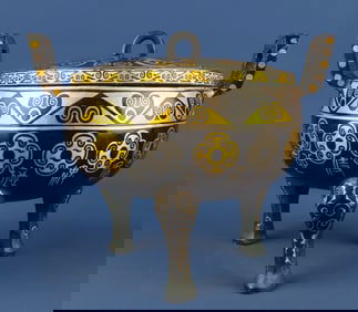 A bronze gold and silver lid tripod of the Han Dynasty