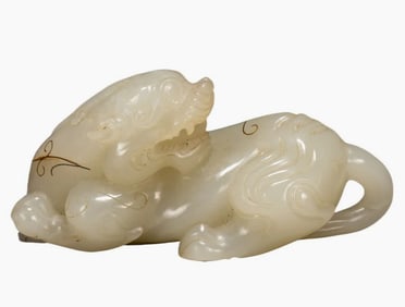 A Qing Dynasty Hetian jade beast