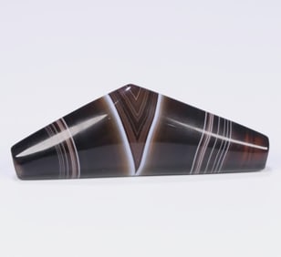 A thousand-year-old silk wrapped agate horn dzi